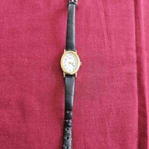 Gold and Black Leather Strap Watch